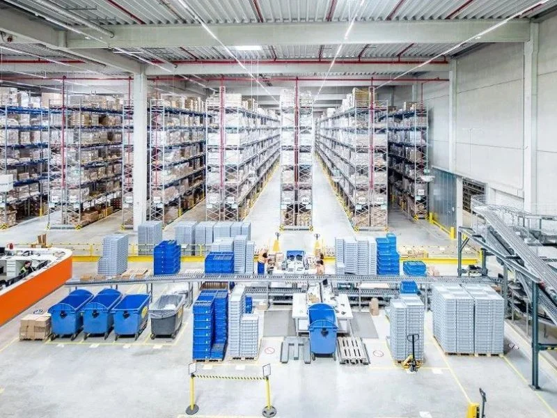 High-density warehouse racking representing physical RF obstacles